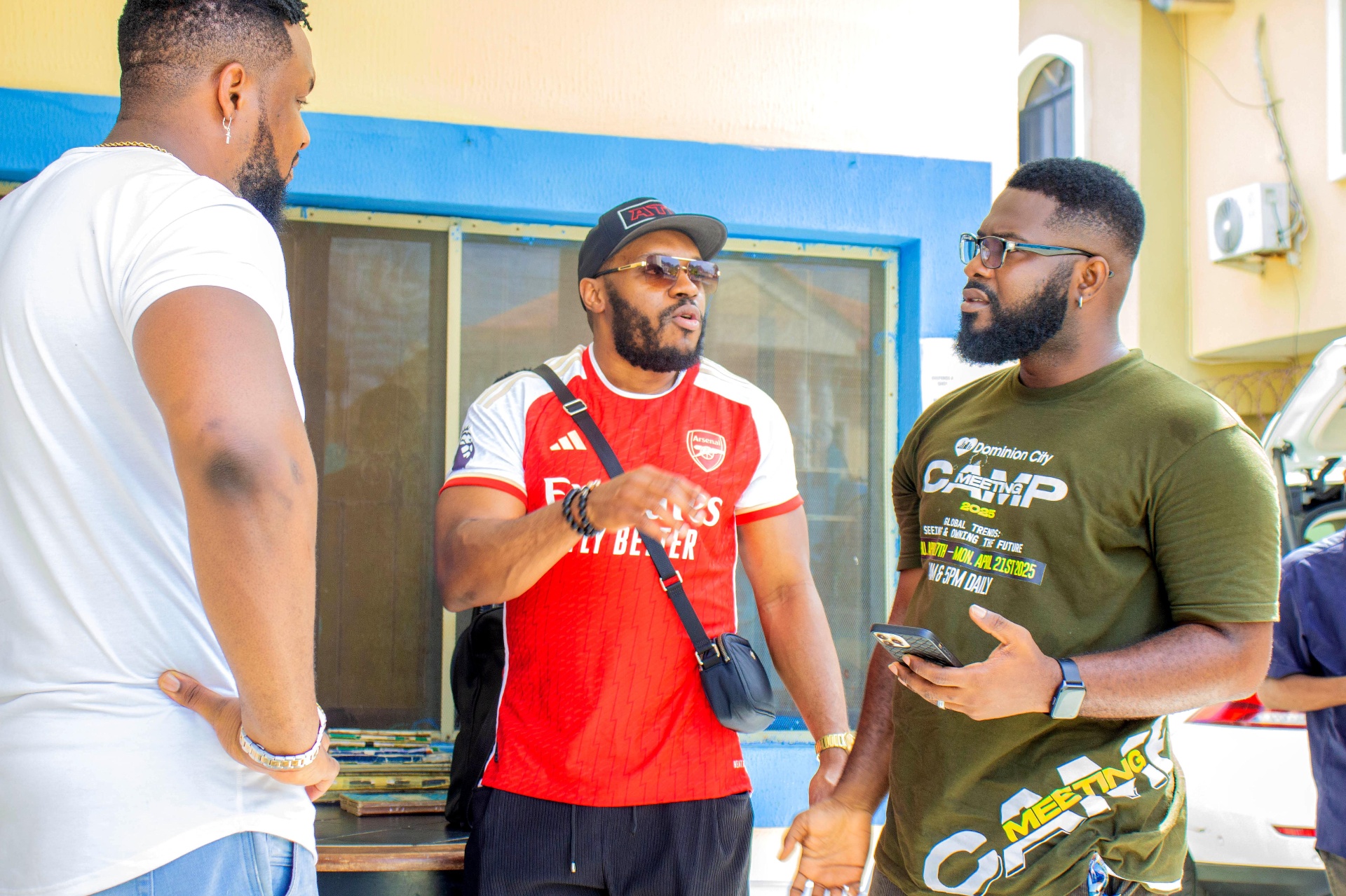Team members in conversation during outreach